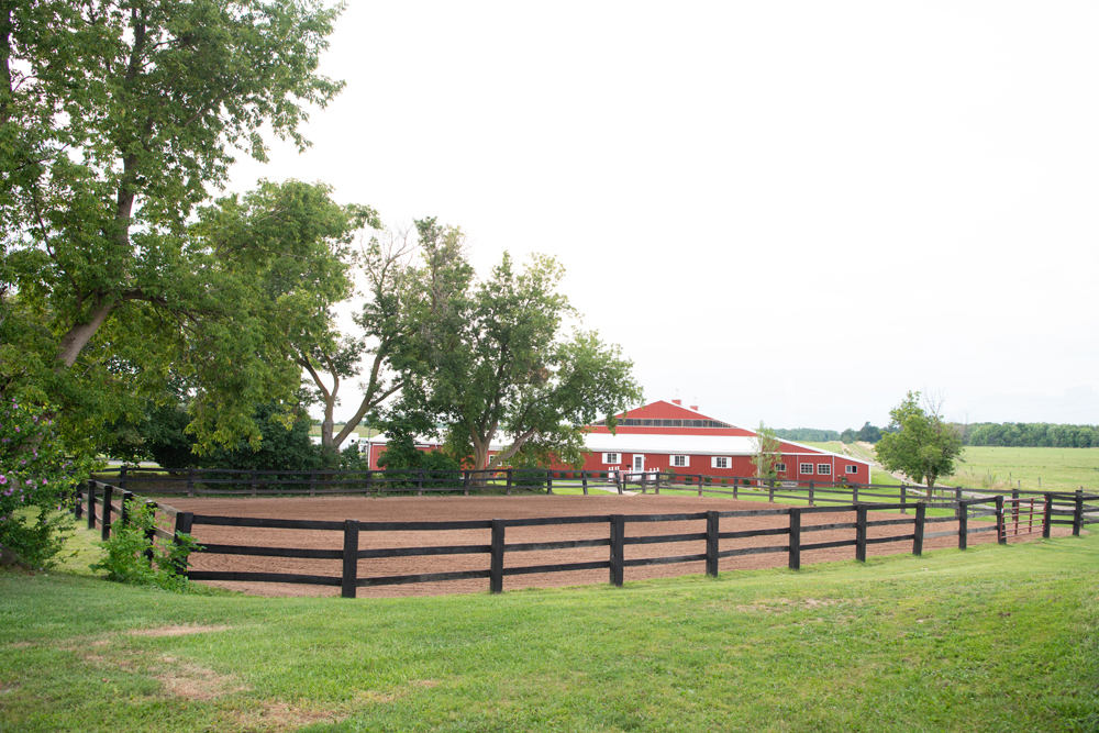 Sand arena in front of the barn at Amy Hanssen Training Center