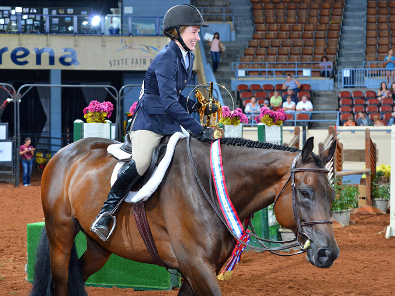 Maddy Keyes and Classic Circle take a victory lap with trophy at AQHYA World Championship Show